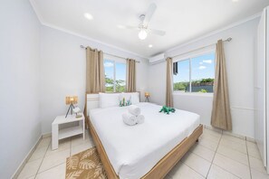 Indulge in luxury with a king bed and AC, complemented by a charming window and stylish lampshade. This serene space is perfect for restful nights and cozy mornings!