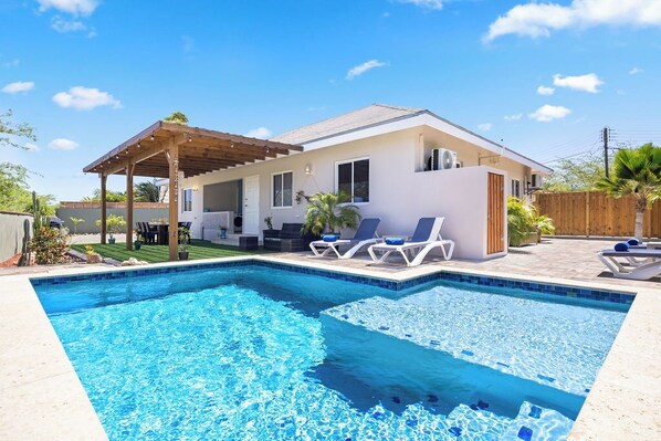 Welcome to your personal oasis with this inviting pool! Perfect for refreshing swims, sun-soaked afternoons, and unforgettable gatherings with family and friends