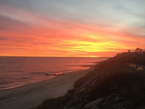 Beautiful sunset beach views just a 1 minute walk from your vacation home!
