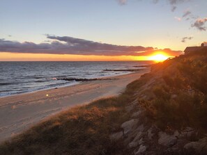Beautiful sunset beach views just a few minutes walk from your vacation home!