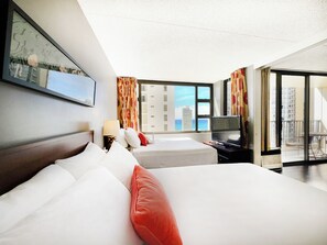 Relax in your bedroom with 2 queen-size beds and a beautiful ocean view.