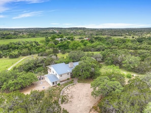 This home boasts 30 acres of mature trees.