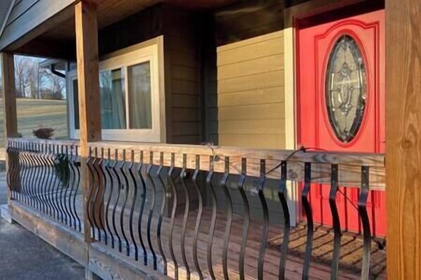 Separate porch and entrance to the studio apartment. Parking directly in front. 
