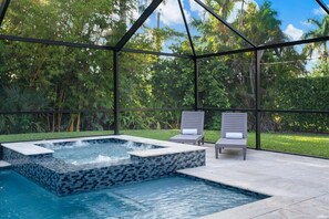 Backyard Bliss, Relax by the spa with views of the serene bamboo 