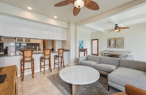 5 - living room couch and kitchen bar seating