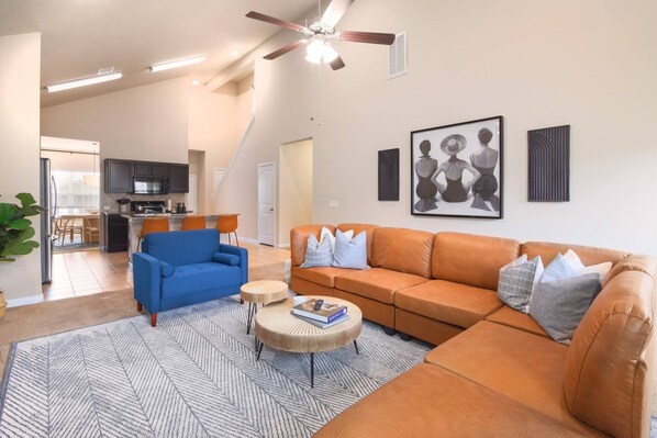 Gorgeous gather area with comfortable seating and soaring ceilings. Relax with friends before heading out to grab dinner and enjoy the nightlife at The Domain.