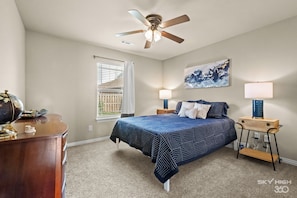 Bedroom 2 has a queen size bed and shared bathroom in the hall!