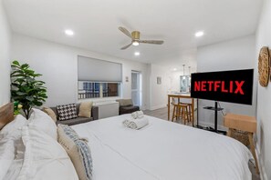 Relax and recharge in our inviting bedroom with a queen size bed. Comfort and calm await you.