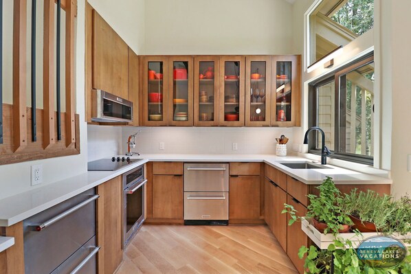 Contemporary kitchen with under the counter refrigerators (no dishwasher)