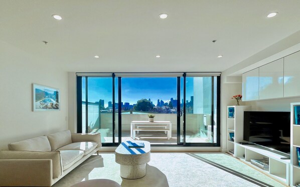 Lounge room leading out to large terrace