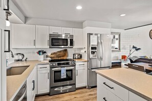 open kitchen space to rest of first floor to all be together