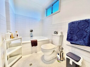 Upstairs Bathroom with bathtub