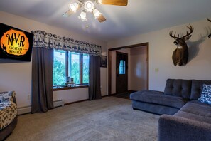Entry door and open living area.