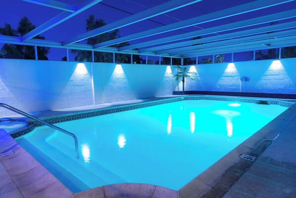 Large pool for swimming laps. Goes from 3ft to 5ft deep. Secured by Safety gate