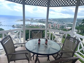 Quench your thirst with Jamaica's Red Stripe Beer while enjoying the views