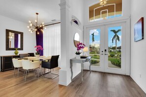 Front double door entrance with 14' ceiling height.