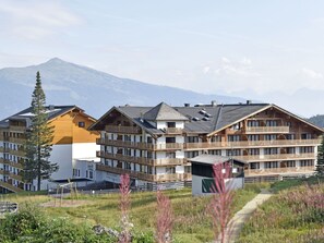 Sky, Plant, Building, Property, Window, Mountain, Land Lot, Urban Design, Cloud, Neighbourhood