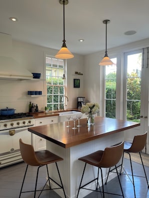 Eat in kitchen with built-in high end appliances
