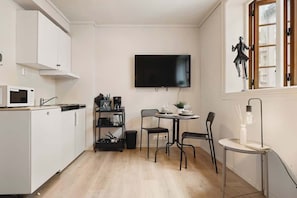 Cook, dine, and relax in one harmonious, well-lit space.