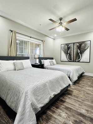 Stay cozy in this second bedroom with two queen beds.