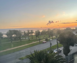ACTUAL VIEW: Enjoy the everchanging bay and beach view day and night from the living and bedroom. 