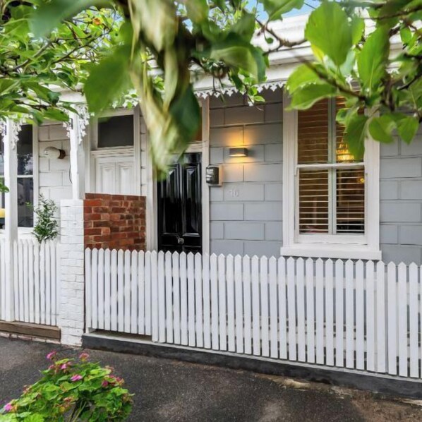 FRONT: Behind this charming traditional Victorian façade is a delightful renovated two bedroom home with large rear living area and sunny outdoor  courtyard with barbeque