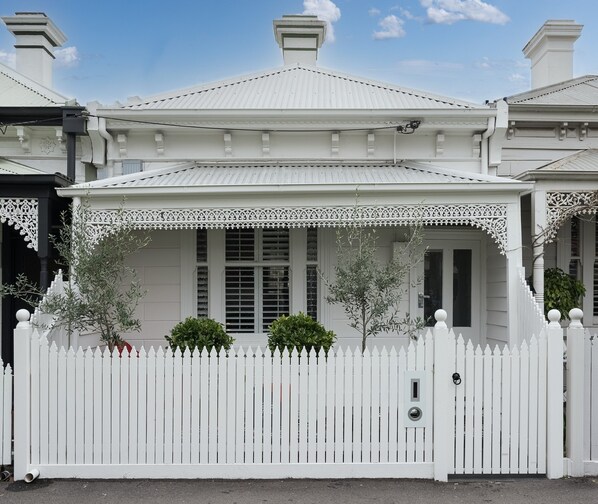 FRONT: Behind this charming Victorian façade is a totally restored two bedroom home with original features. Great house, brilliant location. Just moments from the beach and shops.