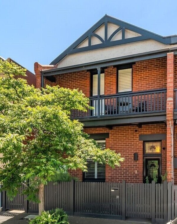 FRONT: Behind this traditional façade is a fully renovated, architecturally designed stylish home. 