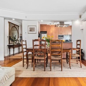 DINING: The classic French Provincial table and chairs is perfect dining and entertaining and comfortable seats six.