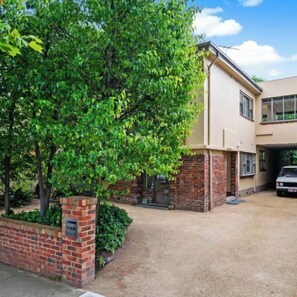 DRIVEWAY: The driveway provides off street parking for up to six cars.