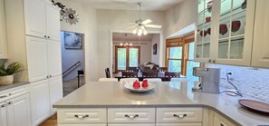 Large prep area with 4 barstools