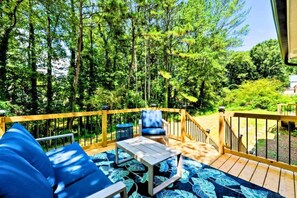 Our outdoor oasis, where modern comfort meets natural beauty on a spacious deck.