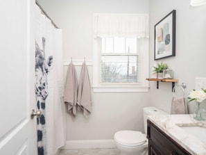 Spacious bathroom with vibrant natural lighting