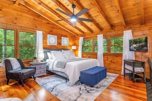 King bed primary loft bedroom with beautiful views and natural lighting