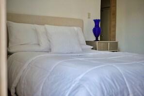 Primary bedroom .> TvSmart.>ExtraSheets.Private Bathroom