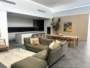Rear Extension - open plan Living/Dining/Kitchen. Bi-folds to Pool + Deck & Outdoor Entertaining