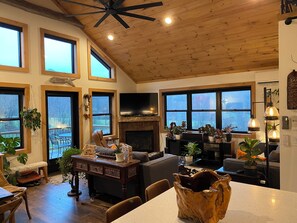 Family room showing fireplace, tv and seating areas