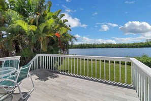 From the 2nd floor open balcony, you'll enjoy a picturesque view of Little Hickory Bay, and beautiful sunset skies at night.