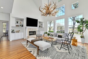 Natural light bathes the living room in a warming glow