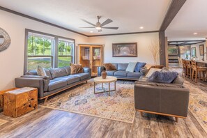 Living room with 3 leather sofas