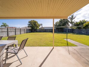 Enclosed back yard perfect for dogs.
