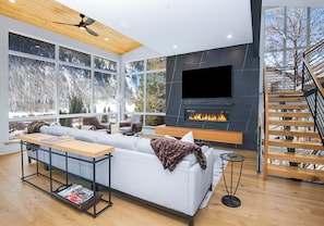 Living room with modern luxurious finishes and spectacular views