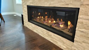 Luxury gas fireplace on main floor