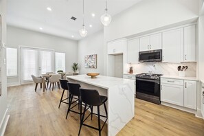 Chef’s Dream Kitchen 👨‍🍳🔥 - Quartz waterfall island, high-end appliances, and a sleek modern design!