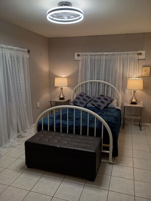 Bedroom one, full size bed, darkening shades. Extra linens in closet