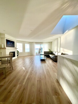 Cascading waterfall quartz countertop.