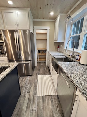In kitchen facing toward pantry