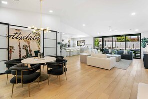 Great room with dining table and living room