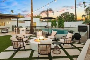 Fire pit with chairs  surrounding for a warm relaxing night