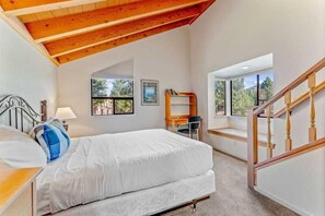 Bedroom 1: Queen bed, closet, window seat, dedicated workspace, access to bathroom 1, main floor